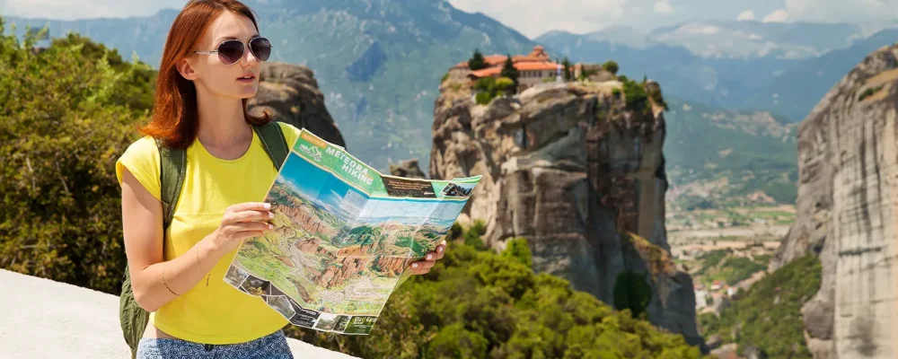 beautiful-tourist-greece-with-meteora-monasteries-background